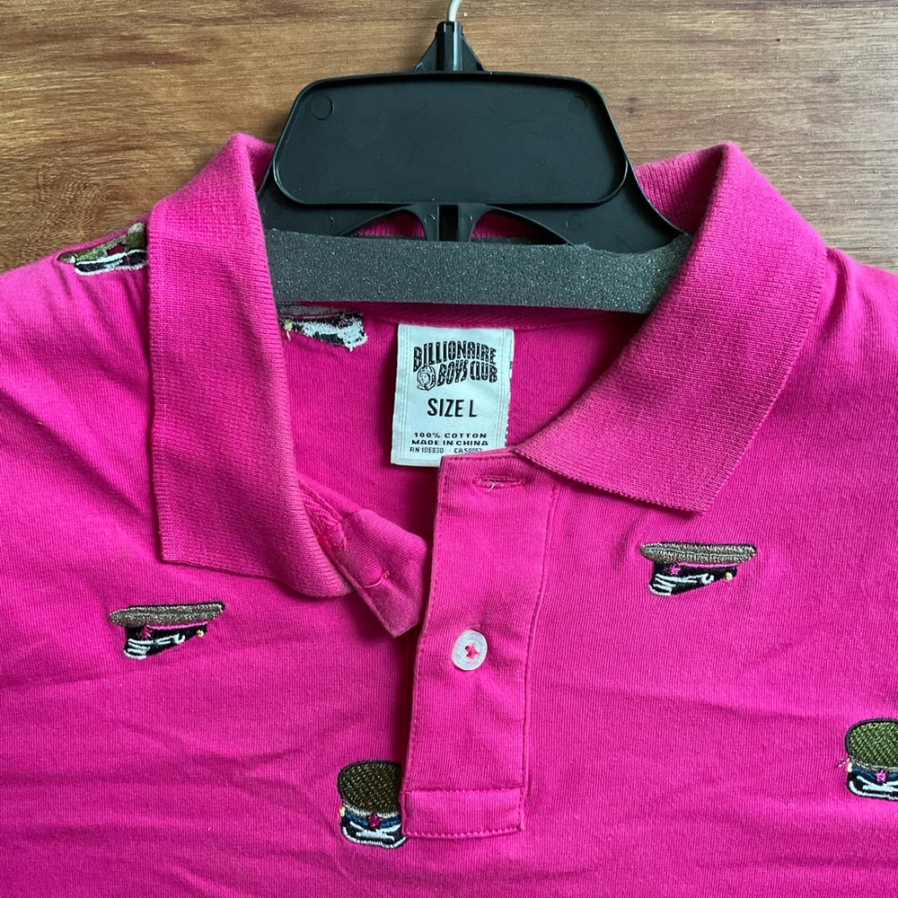 BBC polo shirt.